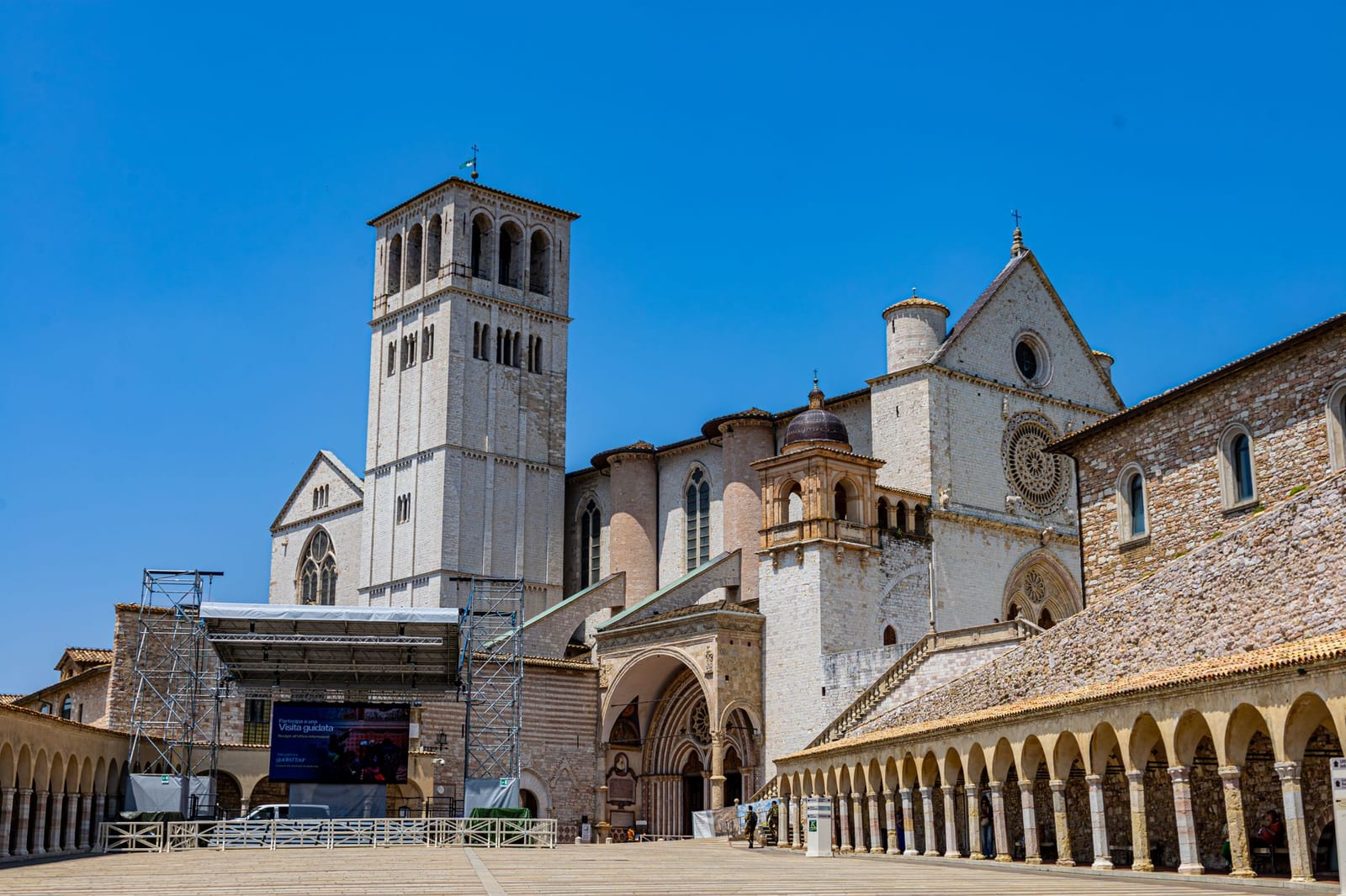The upper church of the Basilica of San Francesco at Assisi, campanile beside the pilgrim square