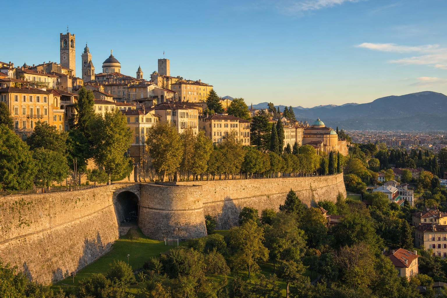 Bergamo's upper town rising behind its Venetian ramparts