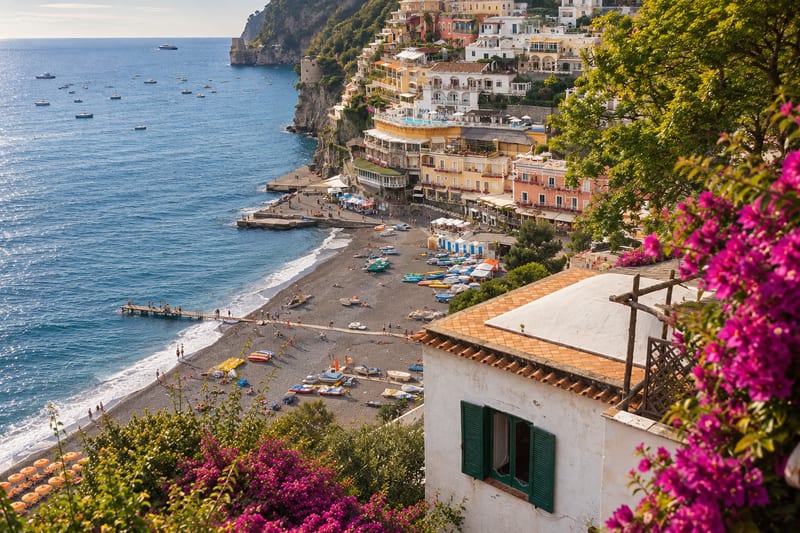 Spiaggia Grande curving below Positano's stacked houses