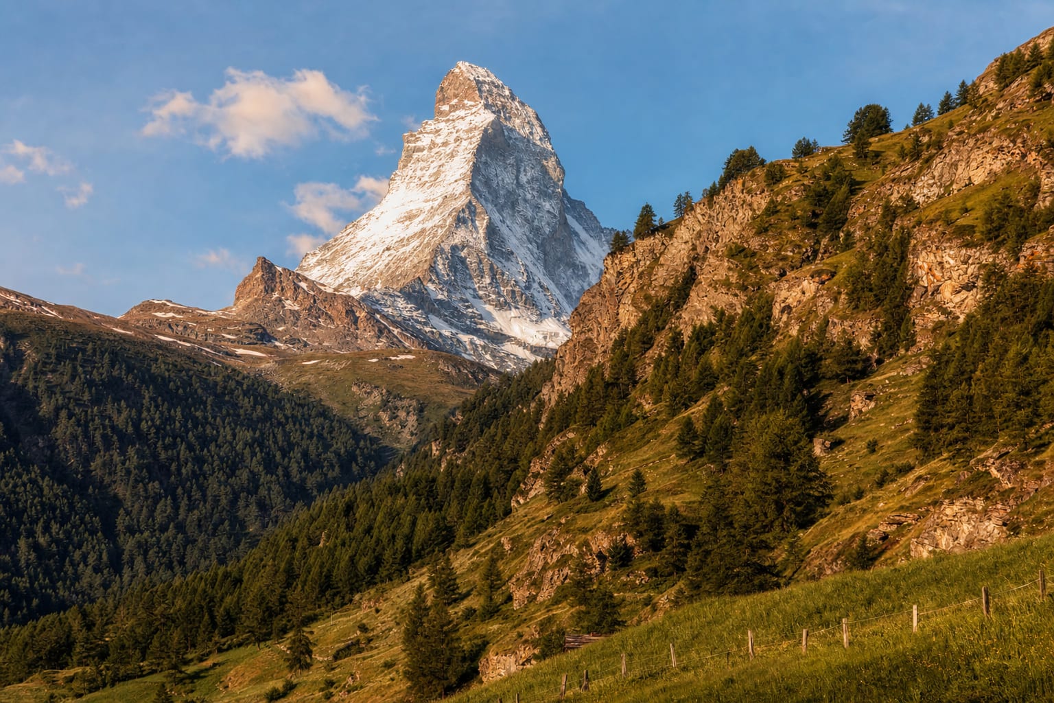 The Matterhorn above golden larch slopes