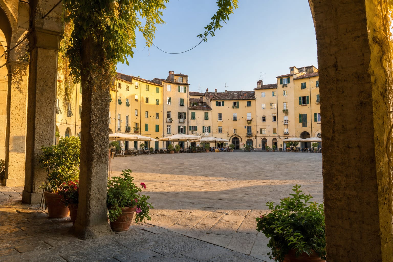 Inside Lucca's oval piazza, the amphitheatre's ghost in its facades