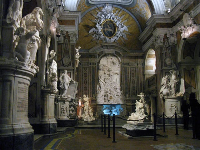 Inside the Sansevero Chapel, the Veiled Christ among its marbles