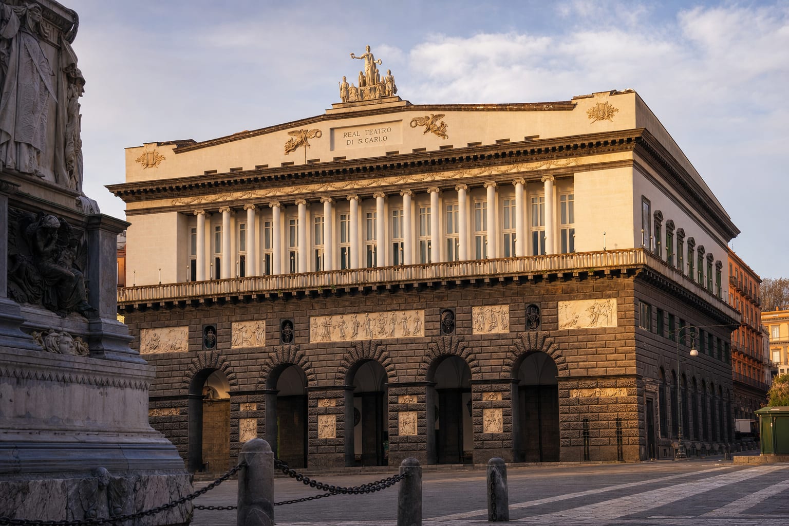 The neoclassical facade of Teatro di San Carlo in evening light, Naples