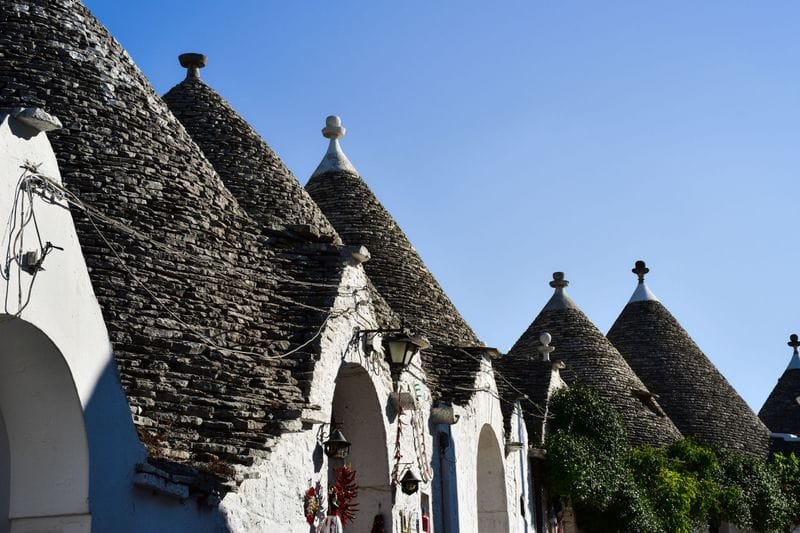 Trulli roofs against the Puglian sky in Alberobello