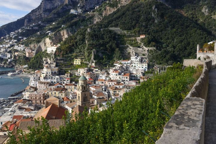 Amalfi climbing its gorge above lemon terraces