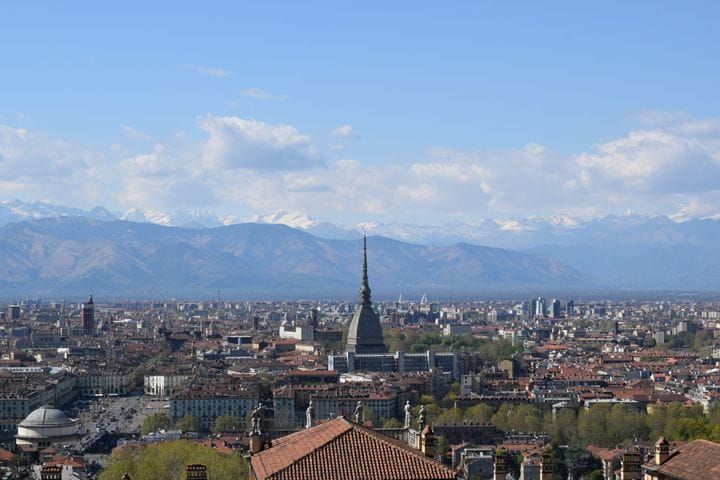 Turin and the Mole Antonelliana against the snowy Alps
