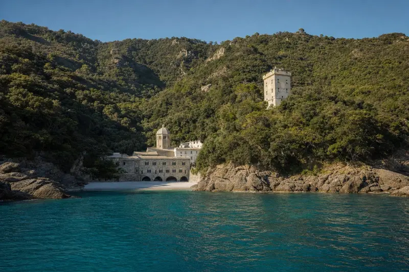 The Abbey of San Fruttuoso and its coastal watchtower above the bay