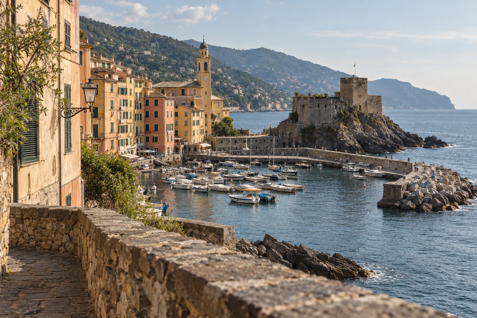 Camogli's boat-filled harbor and painted waterfront houses