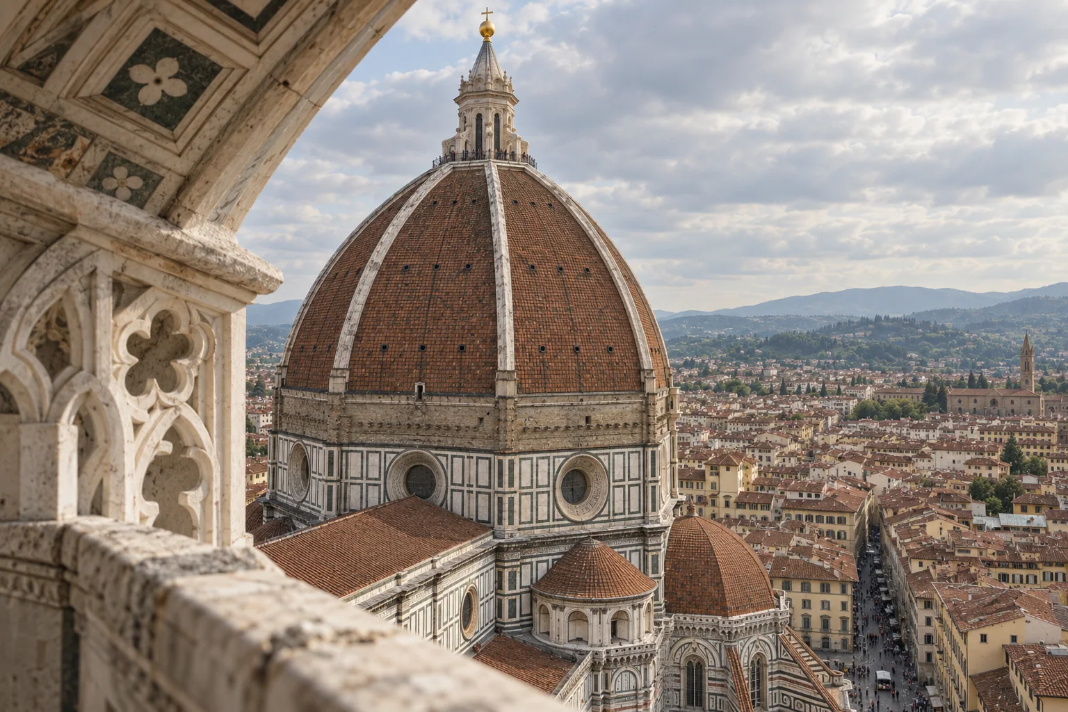 Brunelleschi’s red dome seen up close from the top terrace of Giotto’s Campanile, with the roofs of Florence beyond