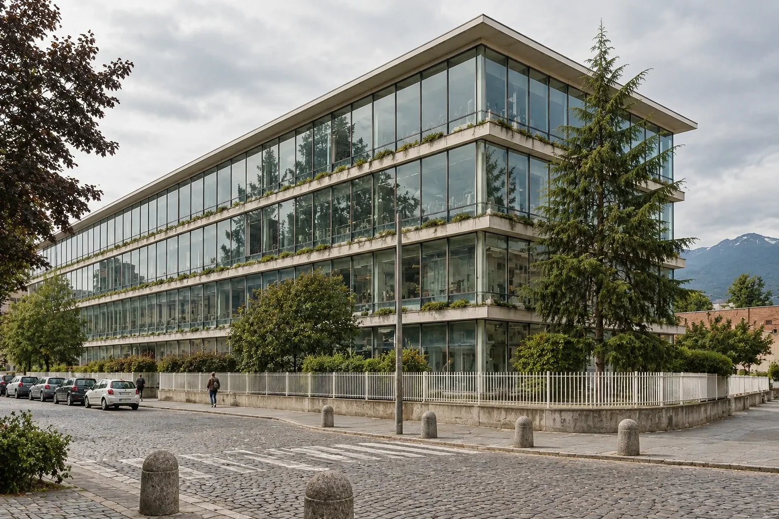 The long glass-walled Officine ICO factory block in Ivrea