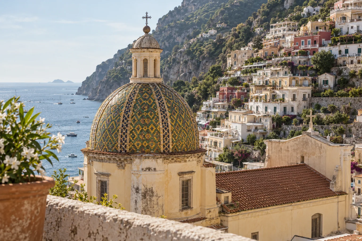 The colorful tiled dome of Santa Maria Assunta in Positano