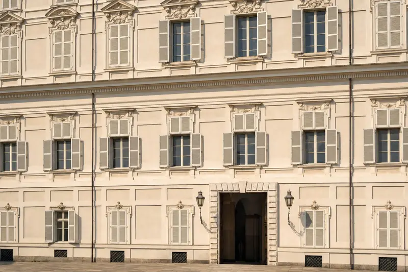The central entrance and shuttered windows of the Royal Palace of Turin