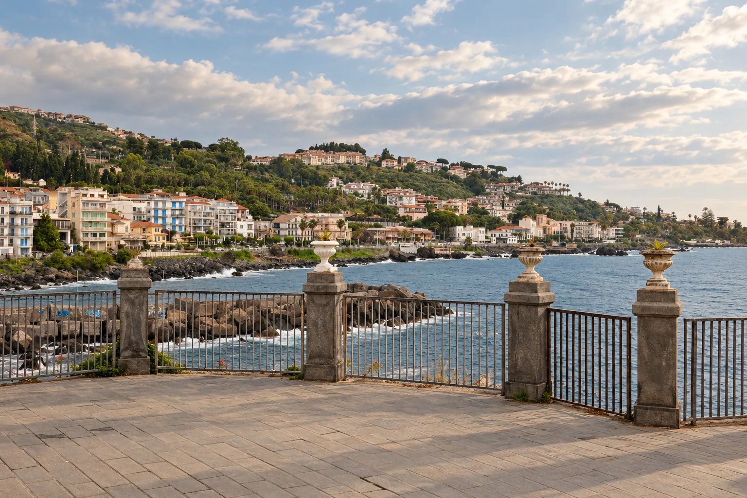 Acireale on its green terrace above the Ionian