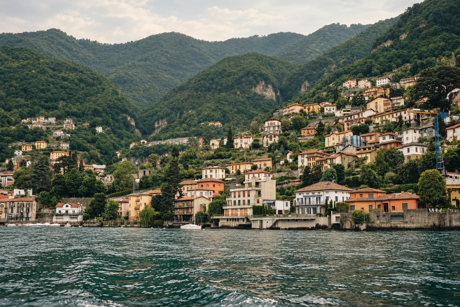 Villas climbing the green shore of Lake Como