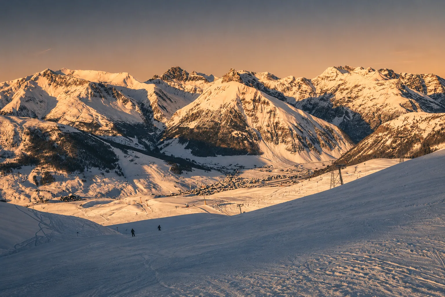 Alpenglow over the white valley of Livigno