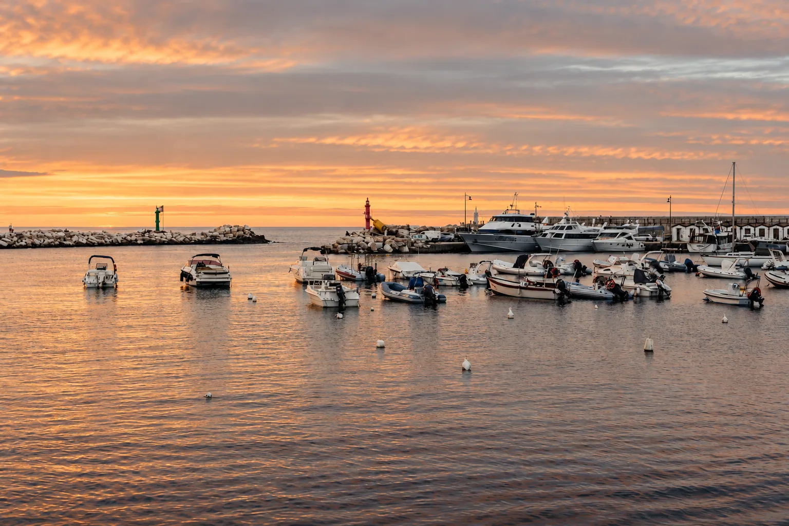 Dawn over the little harbor of Peschici