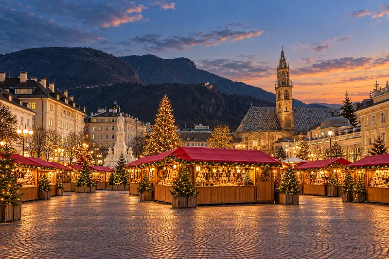 Wooden Christmas market stalls in Piazza Walther in Bolzano