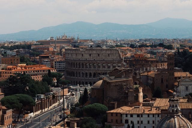 The Colosseum amid the rooftops of Rome
