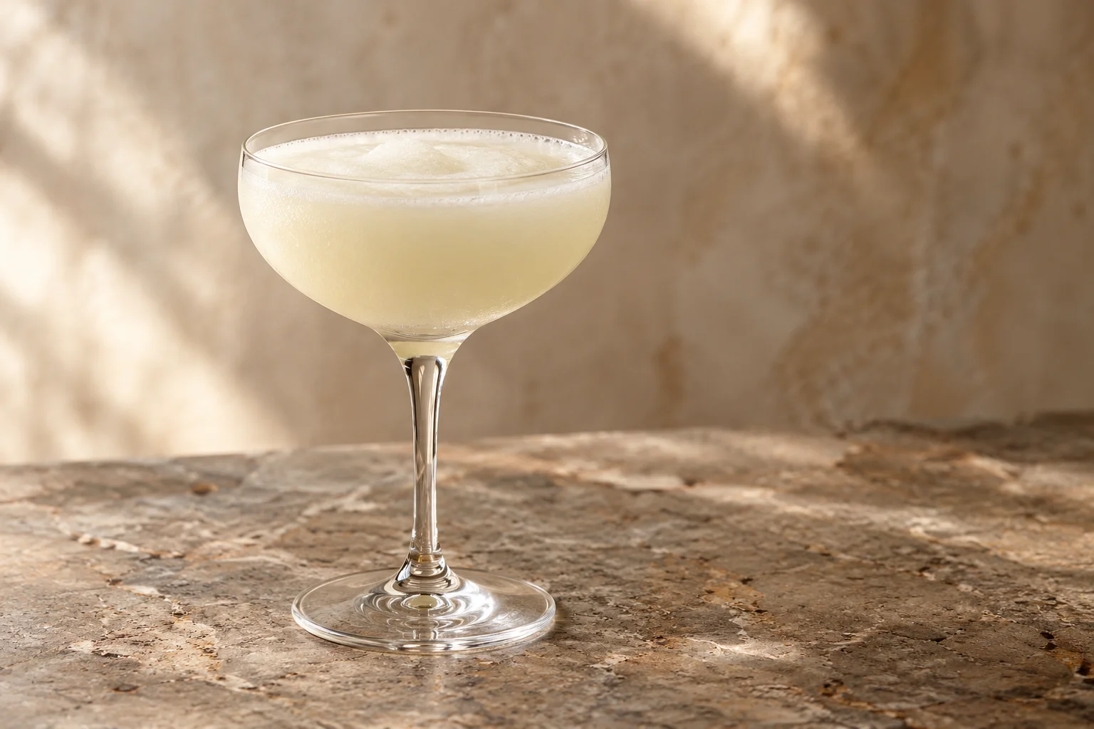 Smooth, frothy lemon Sgroppino in a coupe without a garnish.